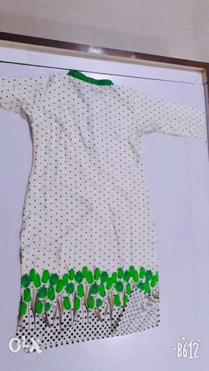 ' M ' size white nd green dots kurti.u wear daily