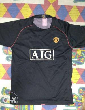 Man Utd black shirt of good quality.