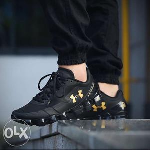 Pair Of Black Under Armour Running Shoes
