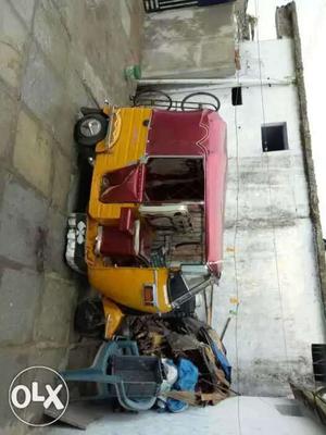 Red And Yellow Auto Rickshaw
