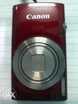 Red Canon Ixus Point-and-shoot Camera