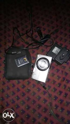 Silver Compact Camera With Pouch And Charger