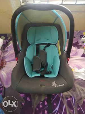 Baby's Black And Teal Car Seat Carrier