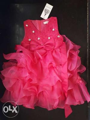 Dark pink frilled frock. Size Age: 3 yrs