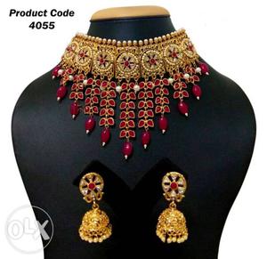 Gold-colored Charm Necklace With Red Gemstone