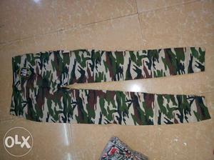 Green, White, And Black Camouflage Pants