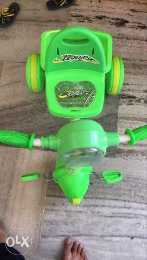 Green color Kids tricycle with strong base Please