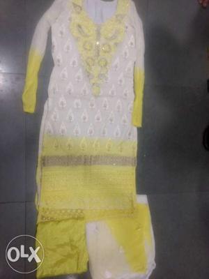 Karachi dress off white n yellow