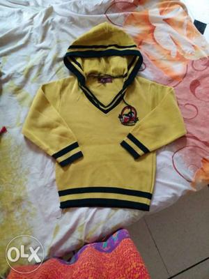 Kids Yellow And Black Pullover winterwear for child (4 to 6