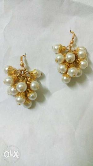 Pair Of Gold-and-white Pearl Earrings
