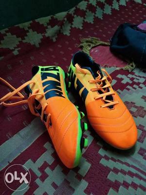 Pair Of Orange-and-yellow Adidas Cleats