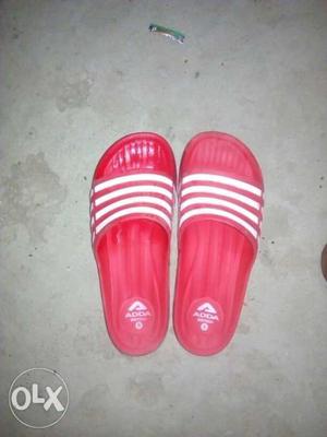 Pair Of Pink-and-white Nike Slide Sandals