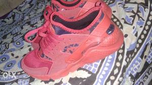 Pair Of Red Nike Huarache