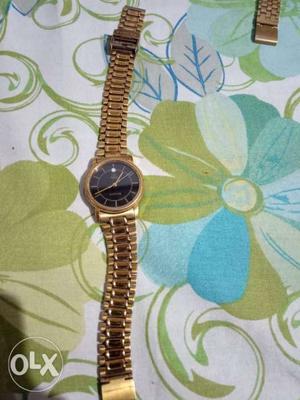 Sonata fully gold colour chain band wrist watch