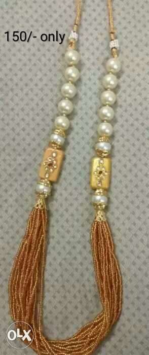 Two Gold-colored Beaded Bracelets