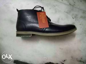 Unpaired Black Leather Work Boot