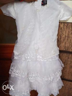 White fairy frock with cap new (with box)