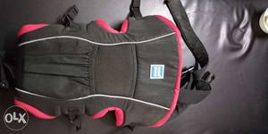 Black And Red Zip-up Baby Carrier