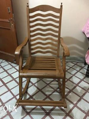 Brown Wooden Framed Padded Armchair