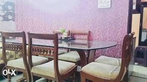 Dinning set with 6 wooden chairs in good condition