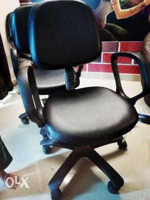 New black revolving office chair. Pair of 4