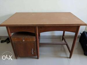 Teakwood writing table with drawers