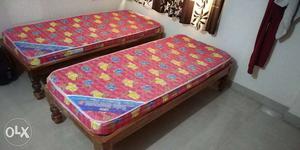 2 single cots with mattress for sale