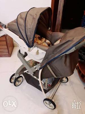 Cosco baby stroller with car seater and infant