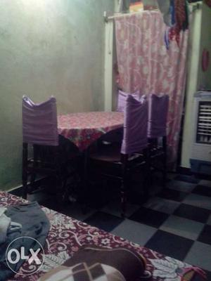 Dining table with four chairs good condition for
