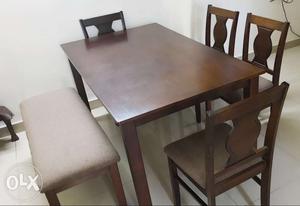 Dinning Table 7 seater(4 chairs 1 bench) 1 yr old