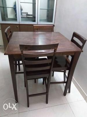 Dinning table,tv trolley, small cupboard, cooking range.
