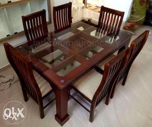 Good condition new dining table with 6 chairs