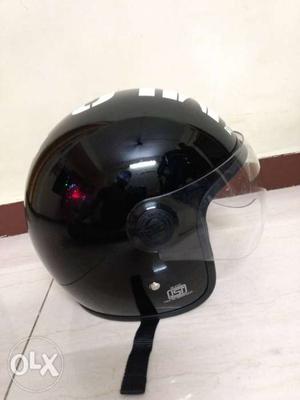 New Royal Enfield helmet Glosi black. no use..Call