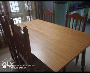 Pure teak wood 4 seated dining table in a very good