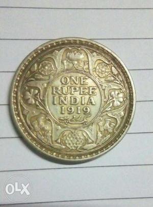 Round One rupee silver Coin.