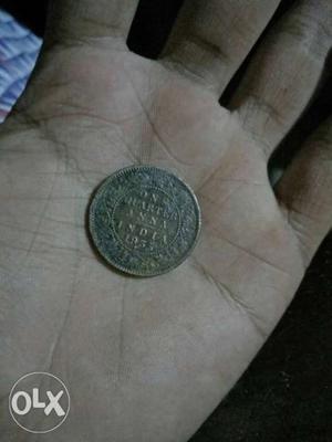Round Silver-colored Anna India One Quarter Coin