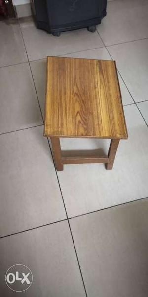 Small slanting table. Good for pooja path or for