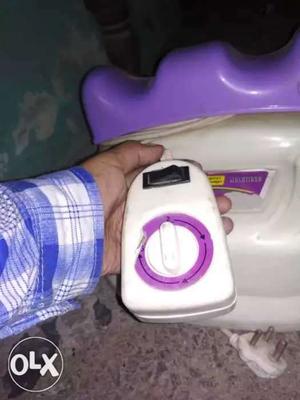 White And Purple Electric Shaver