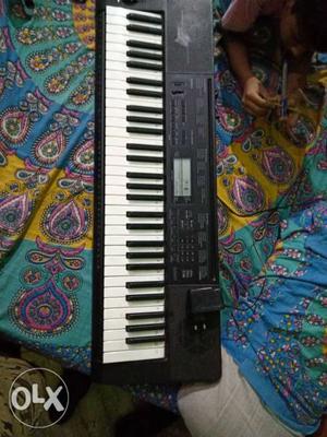 Casio piano with 61 key touch response n pitch with cover
