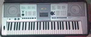 Gray And White Electronic Keyboard