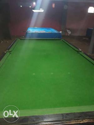 Green And Black Pool Table