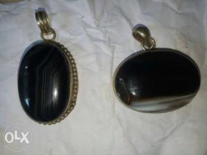 Black And Silver-colored Pendant