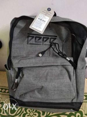 Gray And Black Pepe Backpack