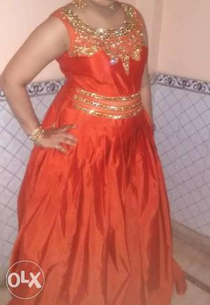 Party wear orange gown.. 1 time wear.. Stuff is