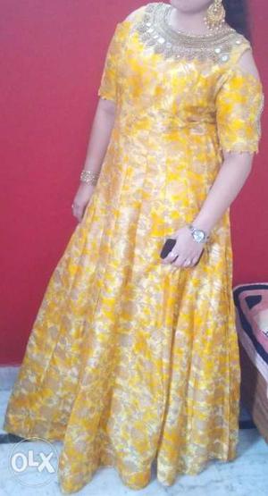 Party wear yellow gown... Good stuff.. Price be