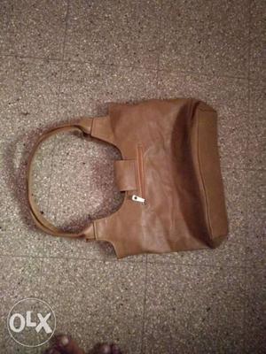 TAN color leather ladies hand Bag