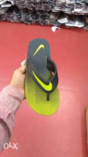 Unpaired Black And Yellow Flip Flop