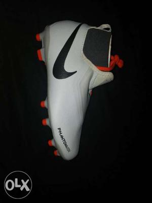 White And Black Nike Cleat