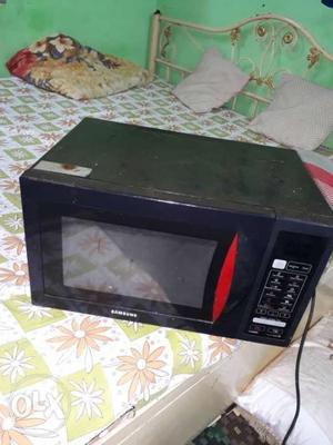 Black And Red Microwave Oven