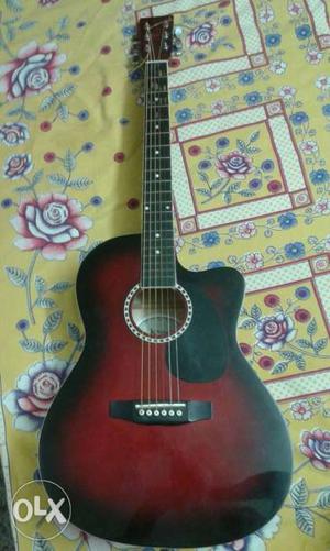 Black And red Acoustic Guitar
